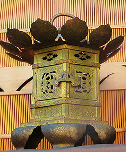 Front view - Pair large gilt hanging temple lanterns, heavy copper, etched, pierced designs of lotus, waves, vines, flowers, clouds, dragons