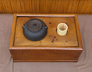 Top view - Thick keyaki wood smoking brazier, tabako-bon), iron pot, for Japanese interior design, garden, tea ceremony, ikebana