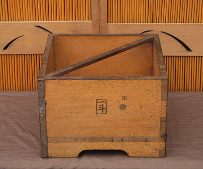 Side view - Wood rice measure, heavy iron handle,  calligraphy, Japanese mingei, for interior design, Japanese garden, tea ceremony